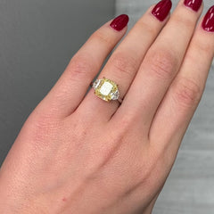 Fancy yellow cushion diamond engagement ring featuring a GIA certified cushion cut diamond.