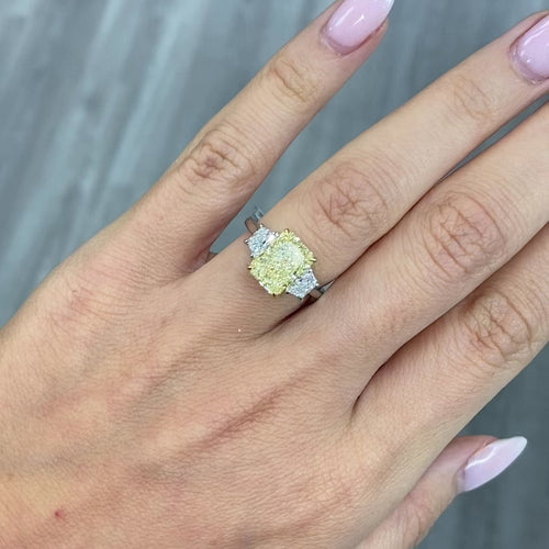 3 carat elongated radiant fancy yellow diamond ring