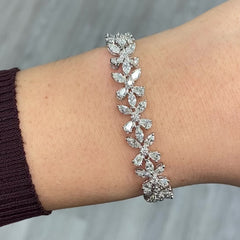 Elegant white diamond bracelet. tennis bracelet. floral diamond bracelet.