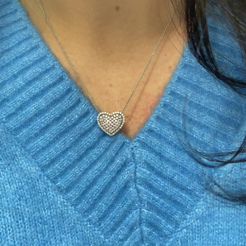 Pink diamond heart shape necklace with natural fancy pink and white diamonds in a diamond halo