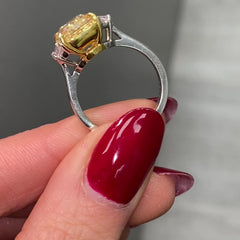 Fancy yellow cushion diamond engagement ring featuring a GIA certified cushion cut diamond.