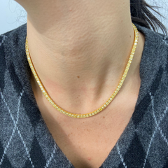 Elegant fancy yellow diamond tennis necklace featuring natural yellow diamond jewelry design with a VS-VVS clarity.