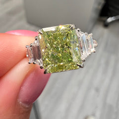 Natural Green elongated radiant diamond ring. GIA green diamond. Natural green diamond. JLO green diamond ring. Long radiant. Rectangular radiant