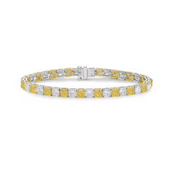 Yellow diamond bracelet. tennis bracelet. alternating diamond bracelet. yellow diamond cushions.