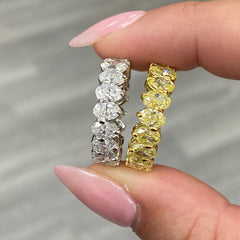 Oval diamond eternity ring. Yellow diamond oval eternity ring. Yellow diamond band. Canary diamond band. Yellow oval diamonds. Fancy yellow oval diamond ring. Yellow diamond stackable rings.