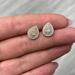 Pink diamond pendant. pink diamond necklace. light pink diamonds. light pink pear shape. diamond pendant. pear diamond pendant.