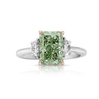 Unique elongated radiant cut green diamond ring, GIA certified.