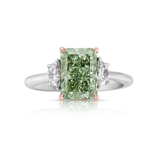 Unique elongated radiant cut green diamond ring, GIA certified.