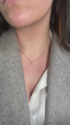 yellow diamond. yellow diamond pendant. fancy yellow. pear shape diamond. diamond pendant.