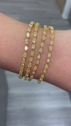 Fancy intense yellow diamond bracelet. Yellow diamond multi shape bracelet. Yellow diamond tennis bracelet. Canary diamond bracelet. Yellow diamond multi shape. Natural yellow diamond bracelet
