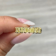 yellow diamond half eternity band. yellow cushion eternity band. yellow diamond ring.