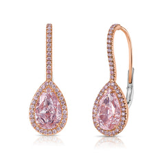 Handmade rose gold earrings featuring a rare matched pair of 2 carat each light pink pear shape diamonds, both VS clarity.