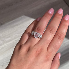 1.37 GIA Light Pink Heart Shape Diamond SI1 Clarity No fluorescence Platinum Ring Handmade in NYC Set with 2 white diamond round side stones and soft white diamond halos GIA Certified Diamond Ready to ship