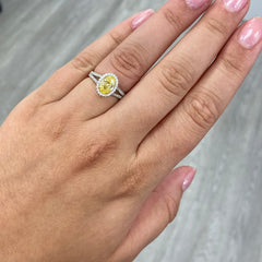 Fancy intense yellow oval diamond ring