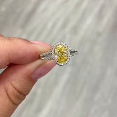 Fancy intense yellow oval diamond ring