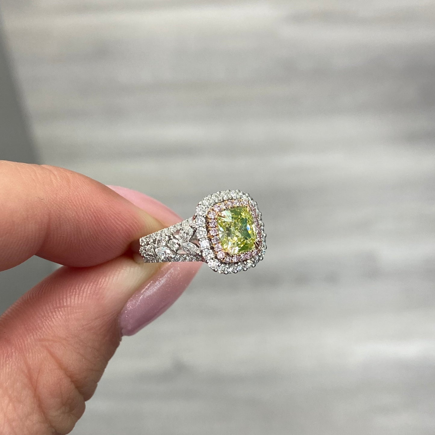 green diamond ring. green cushion cut diamond