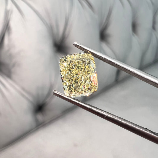 Fancy Yellow diamond elongated cushion cut. Elongated yellow diamond. yellow diamond cushion.