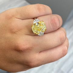 10 carat fancy light yellow diamond cushion cut three stone ring with half moons