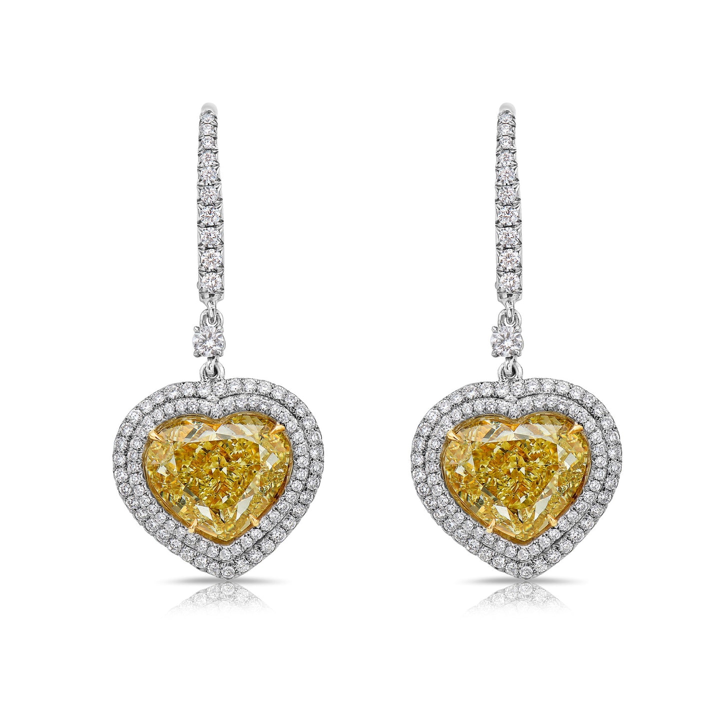 Red carpet yellow diamond earrings. Yellow heart diamond earrings. 10 carat yellow diamond earrings. Yellow diamond drop earrings. Diamond drop earrings. Luxury diamond earrings.