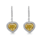 Red carpet yellow diamond earrings. Yellow heart diamond earrings. 10 carat yellow diamond earrings. Yellow diamond drop earrings. Diamond drop earrings. Luxury diamond earrings.