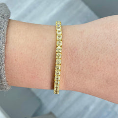 asscher cut diamonds. yellow asscher cut diamonds. tennis bracelets. fancy yellow asscher cut diamond bracelet