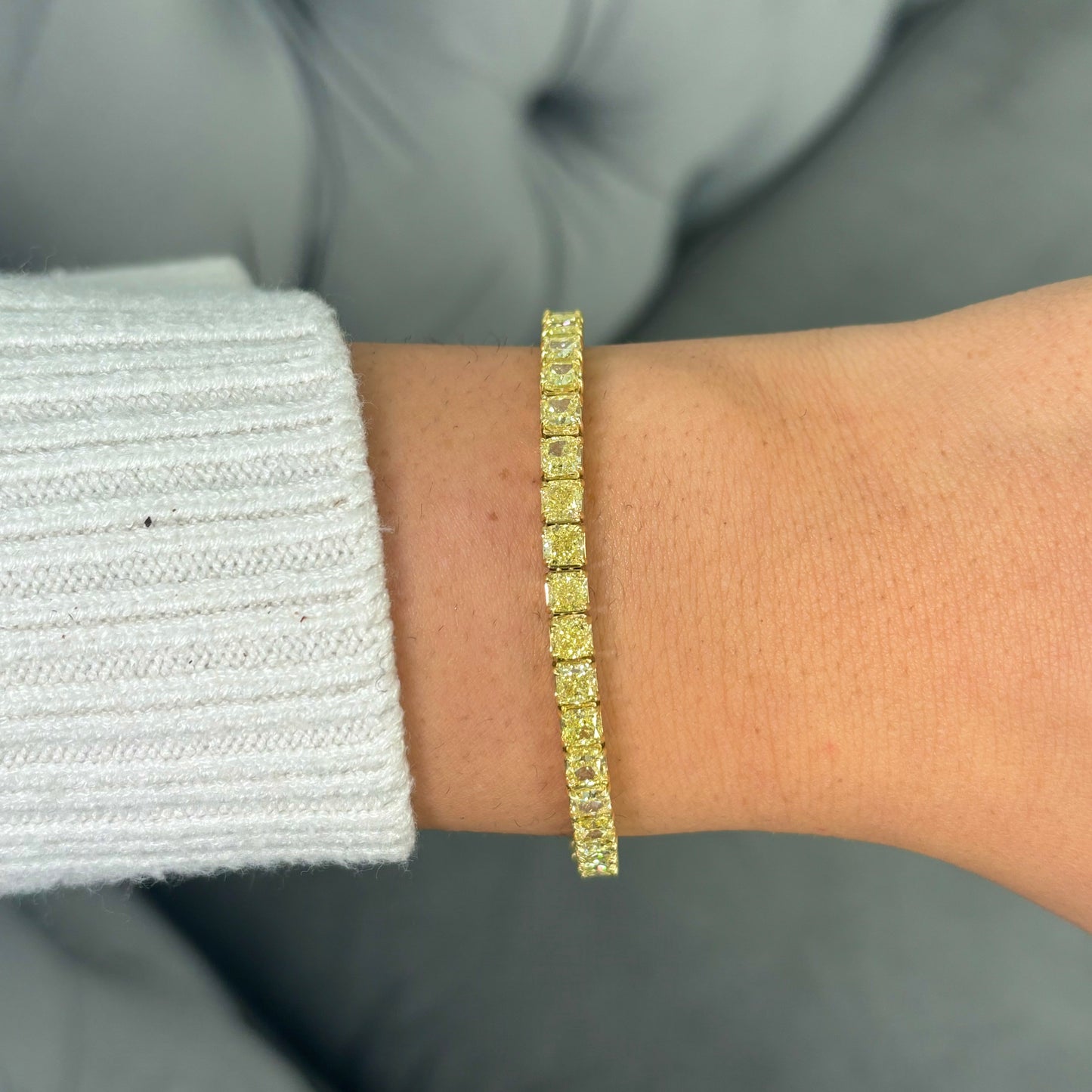 Fancy yellow diamond bracelet. Cushion diamond bracelet. Cushion tennis bracelet. Yellow diamond jewelry. Yellow tennis bracelet. Natural yellow diamonds