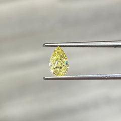 intense yellow. intense yellow diamond. fancy intense yellow. pear shape diamond.