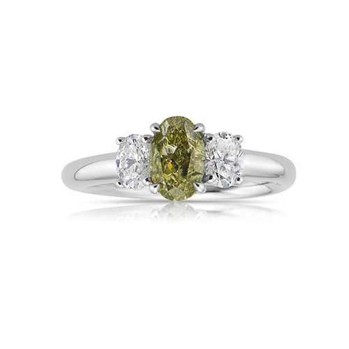 Color changing diamond, chameleon diamond, green diamond, J-Lo green diamond, three stone ring, unique engagement ring