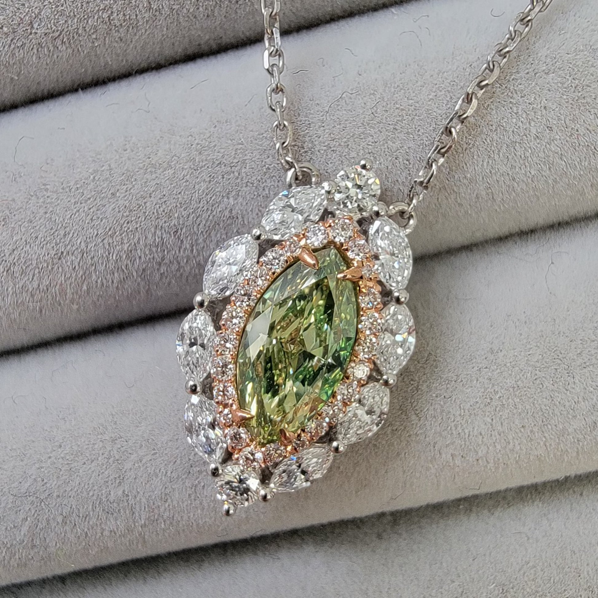 natural green diamond. jlo green diamond. green diamond pendant. fancy colored diamond pendant.