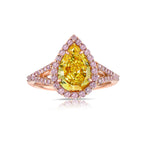 Gia certified yellow diamond. Yellow diamond engagement ring. Yellow diamond pear shape ring. Fancy pink diamonds. Simple halo diamond ring.