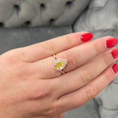 Gia certified yellow diamond. Yellow diamond engagement ring. Yellow diamond pear shape ring. Fancy pink diamonds. Simple halo diamond ring.