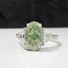 2.00 Carat Oval Diamond GIA Certified Diamond Fancy Grayish Greenish Yellow  Oval Cut Diamond SI1 Clarity  Excellent, Excellent Cutting None Fluorescence 0.31 Carat Side Diamonds  Crafted in 18k White Gold  Handmade in NYC