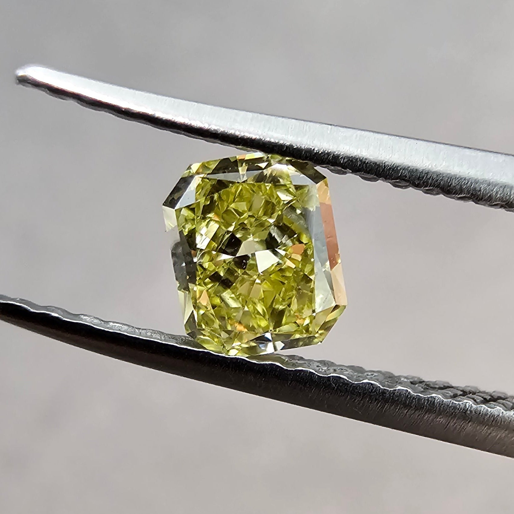 1.50 Carat Radiant Cut Diamond  GIA Certified Diamond  Fancy Intense Yellow  VVS2 Clarity 