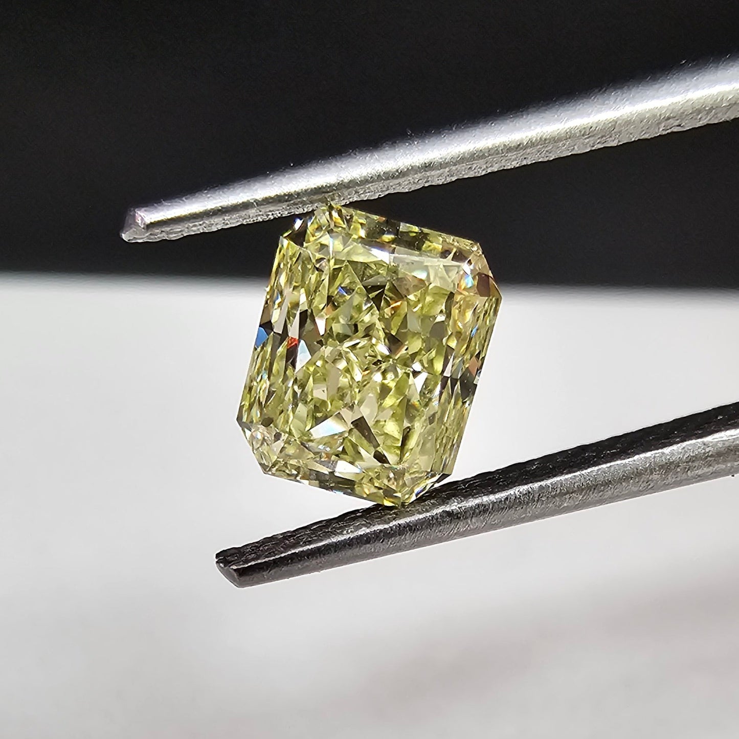 0.96 Carat Radiant Cut GIA Certified Diamond  Fancy Yellow  SI2 Clarity 
