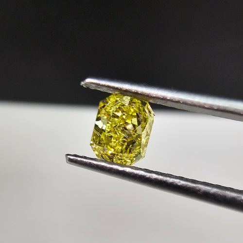 0.36 Carat Radiant Cut GIA Certified Diamond  Fancy Intense Yellow  VVS1 Clarity 