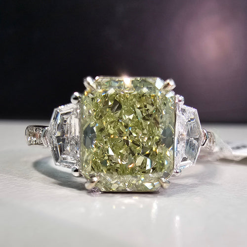 2.13 Carat Center Diamond GIA Certified Diamond Radiant Cut Diamond Fancy Light Brownish Greenish Yellow  SI2 Clarity 0.31 Carats of F VS Cadillac Side Diamonds 0.13 Carats of Round Diamonds  Handmade in 18k White Gold Handmade in NYC