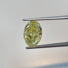 oval cut fancy yellow diamond, natural canary diamond, loose yellow diamond A 3 carat GIA certified Fancy Yellow oval cut diamond, with excellent and very good cutting, and eye clean SI1 clarity. 