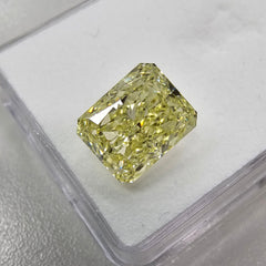 GIA certified fancy yellow marquise cut diamond with VS1 clarity.