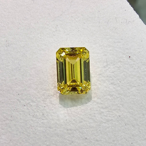 Radiant yellow emerald cut diamond, GIA certified.