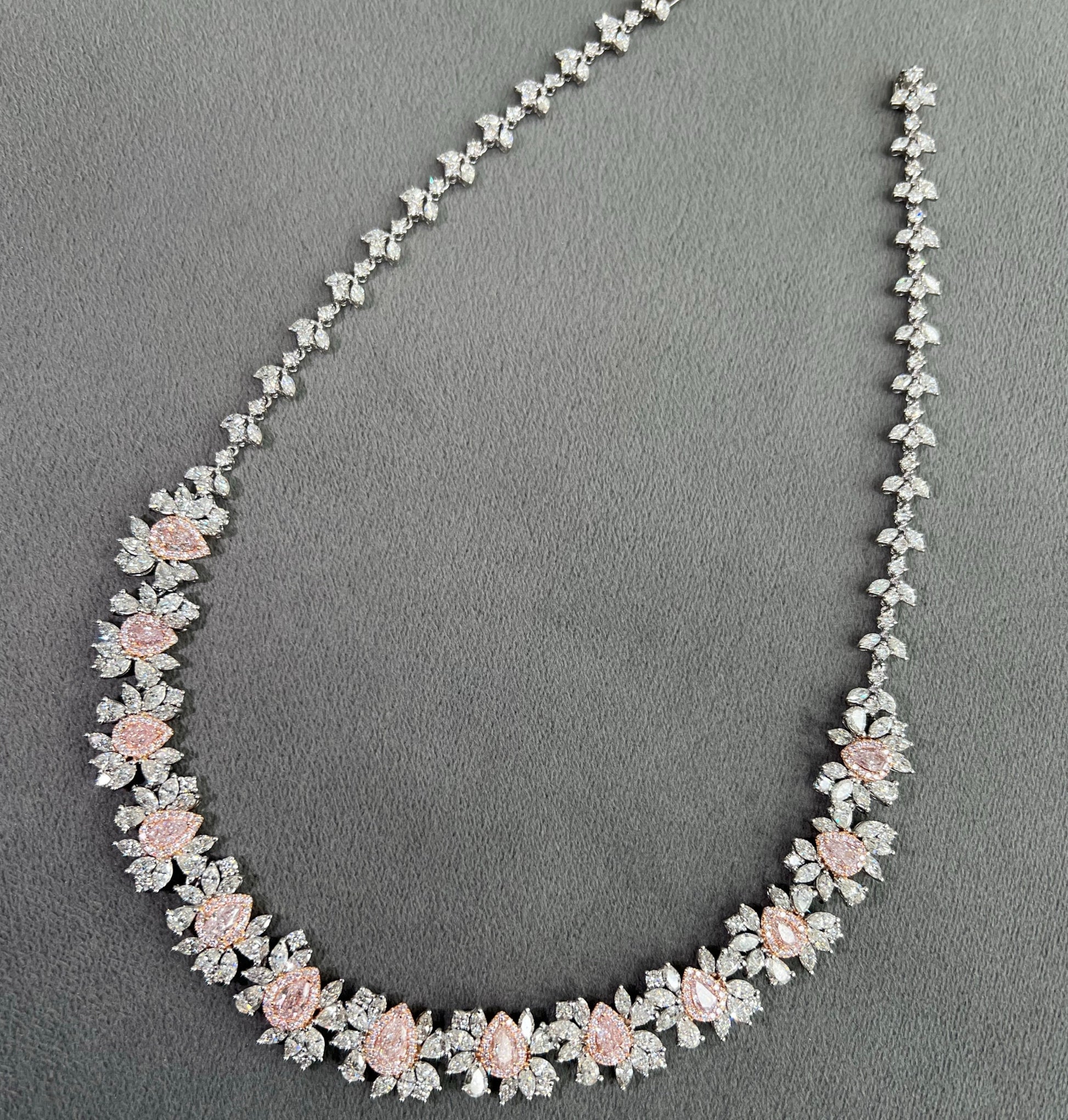 Red carpet pink diamond necklace. Natural fancy pink diamond necklace. Fancy pink diamond jewelry. Pink diamond jewelry. Gia certified pink diamonds