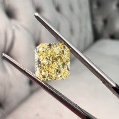 Fancy yellow diamond radiant cut. Yellow diamond square radiant. GIA yellow diamond.