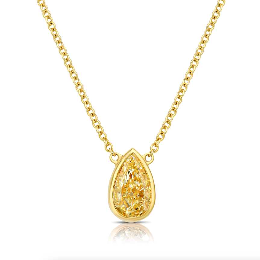yellow diamond. yellow diamond pendant. fancy yellow. pear shape diamond. diamond pendant.