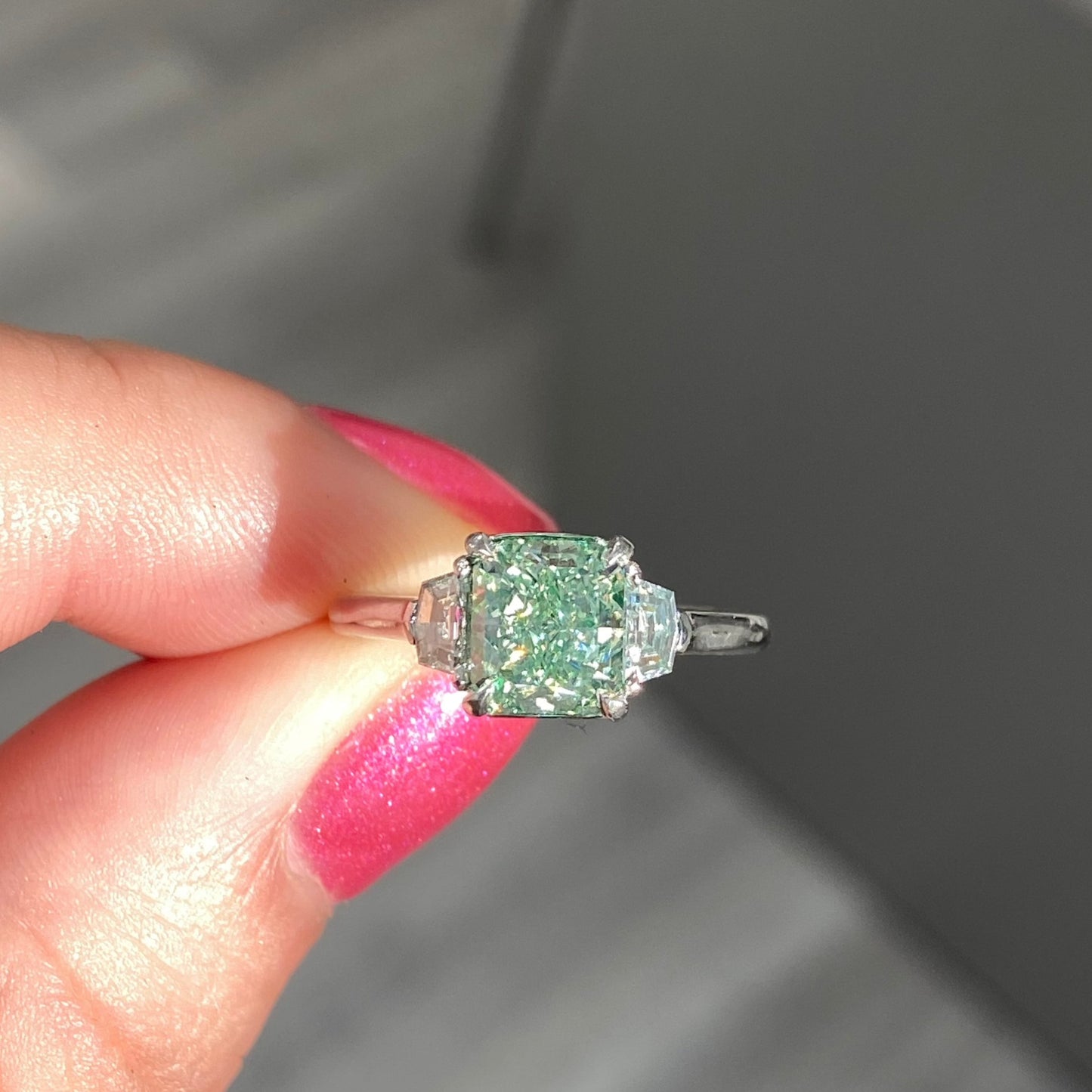 Fancy intense green diamond radiant. Fancy intense green diamond. Natural green diamond. Green diamond engagement ring. Green diamond ring. Rare green diamond ring. Green diamond like Jennifer Lopez. JLO Green diamond. JLO Green.
