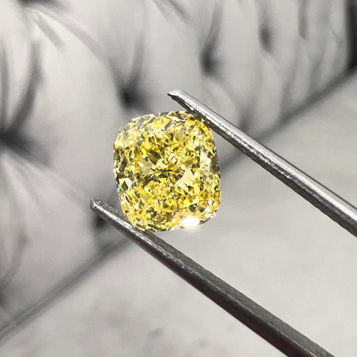 Fancy intense yellow diamond. GIA intense yellow. GIA cushion cut. Canary yellow bright cushion cut.