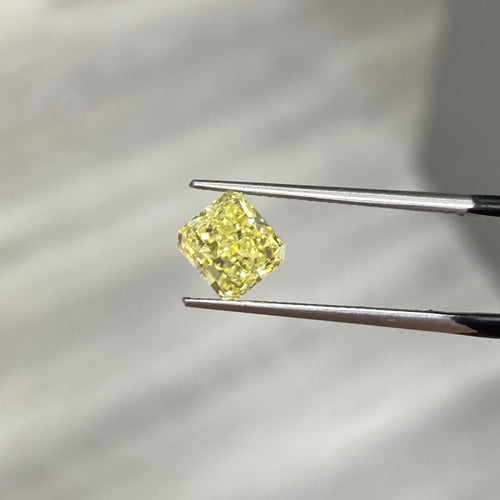 fancy intense yellow. intense yellow. radiant cut. yellow diamond radiant cut. long radiant.