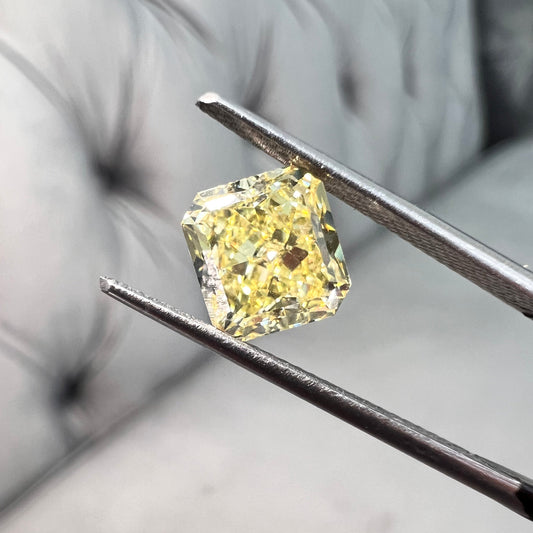 Fancy yellow diamond radiant cut. Yellow diamond radiant. GIA yellow diamond.