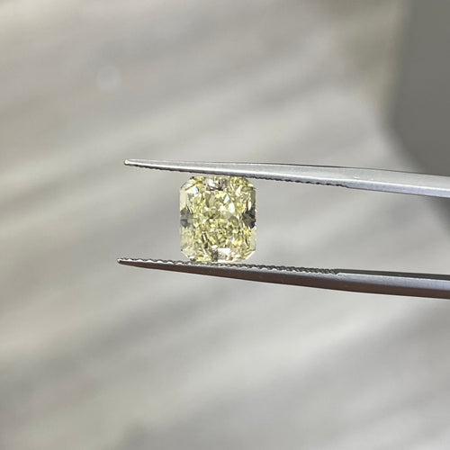 natural diamond. fancy colored diamond. yellow diamond. fancy light yellow diamond. fancy yellow diamond. diamond. internally flawless. yellow diamond radiant cut. radiant cut diamond.