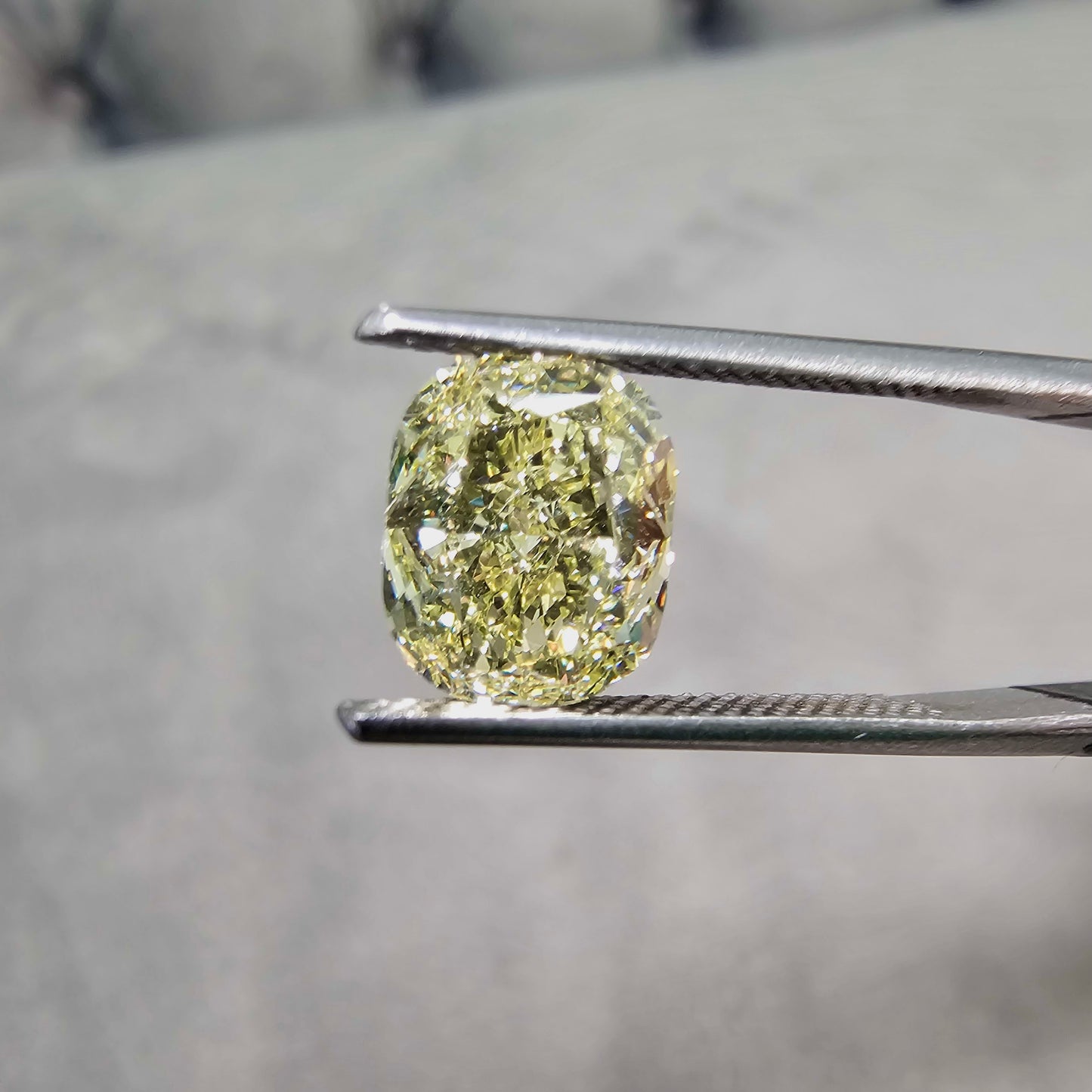 Elonagted ciushion fancy yellow diamond. Long cushion fancy yellow diamond.