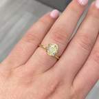 fancy light yellow oval diamond