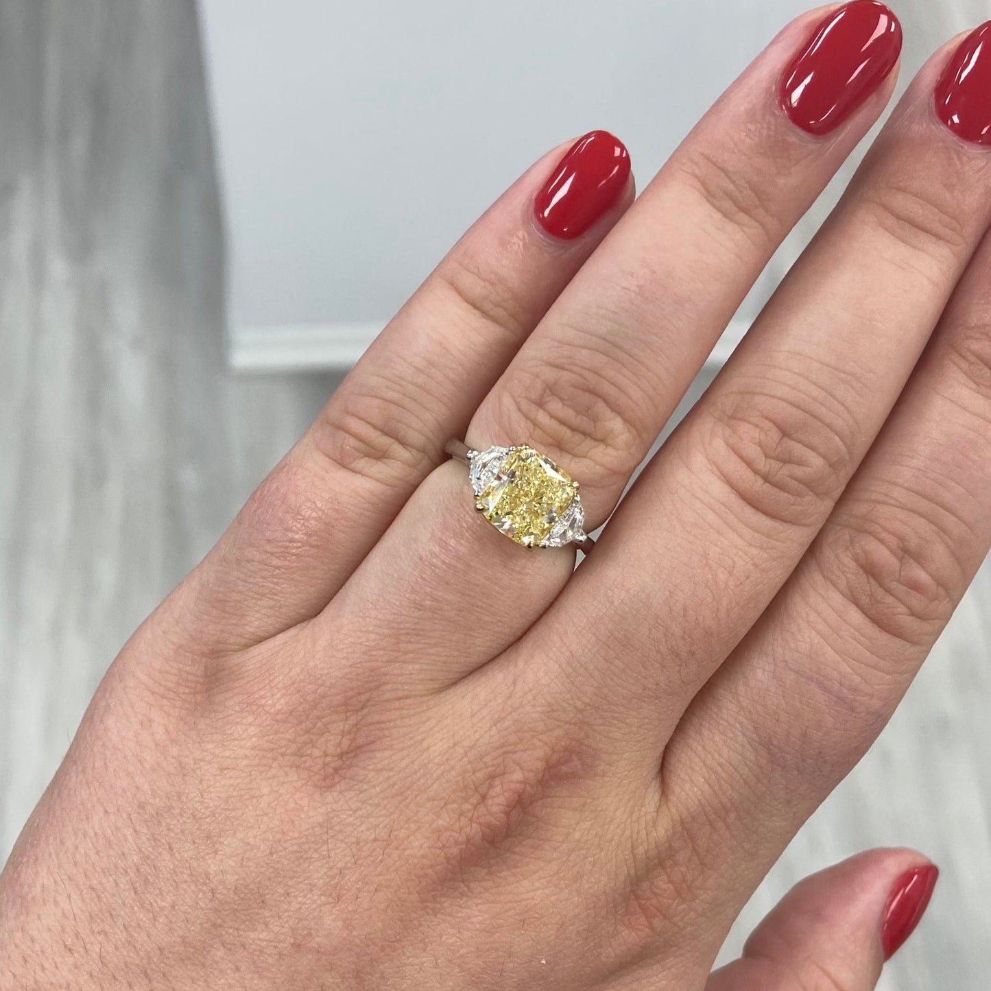 Fancy Yellow diamond 3 stone ring.